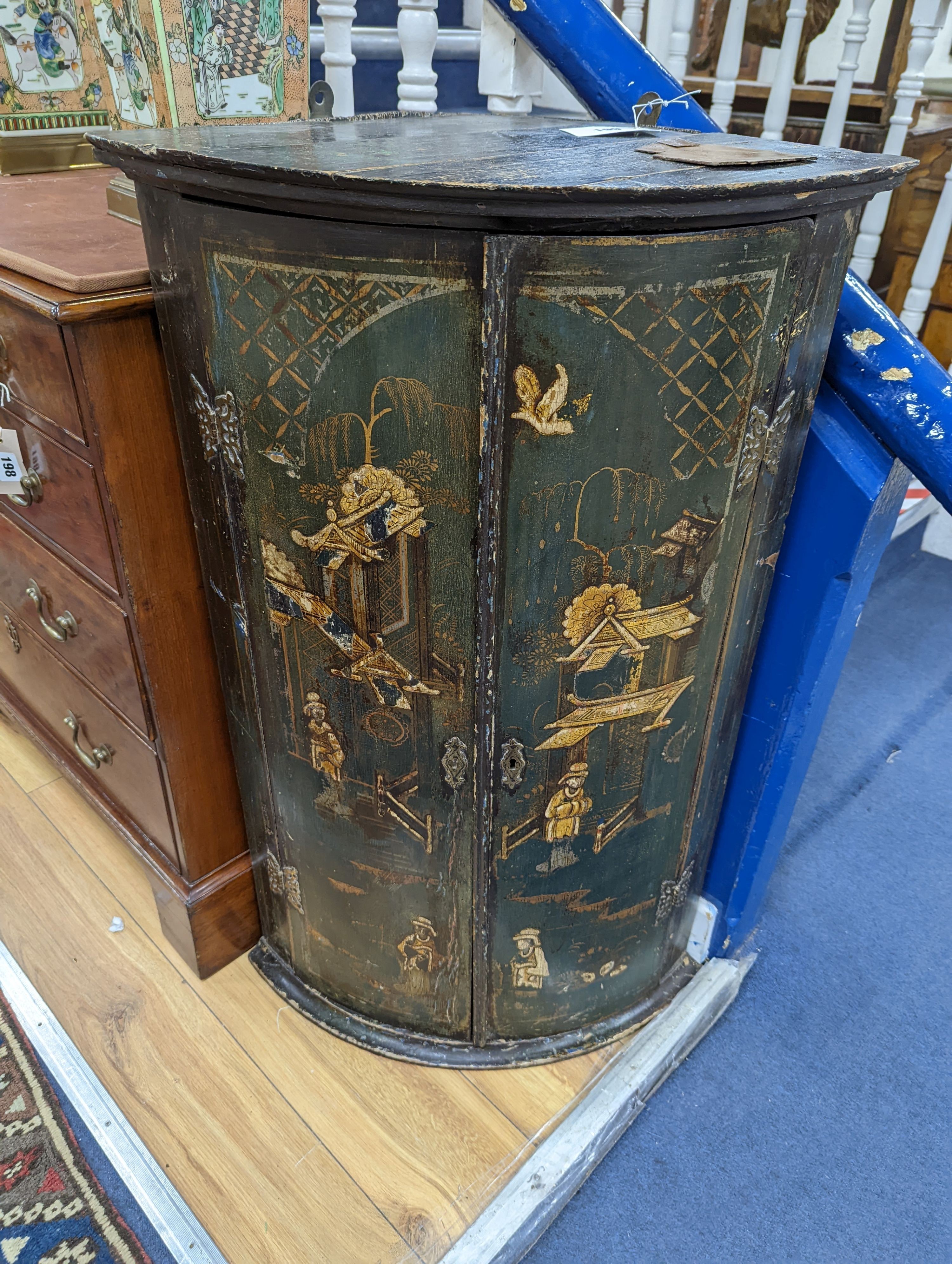 An 18th century Japanned lacquer bow front hanging corner cabinet, width 58cm, depth 39cm, height 92cm